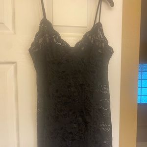 Victoria’s Secret black lace slip size small. Good condition